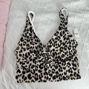Longline bathing suit top with cut out in front